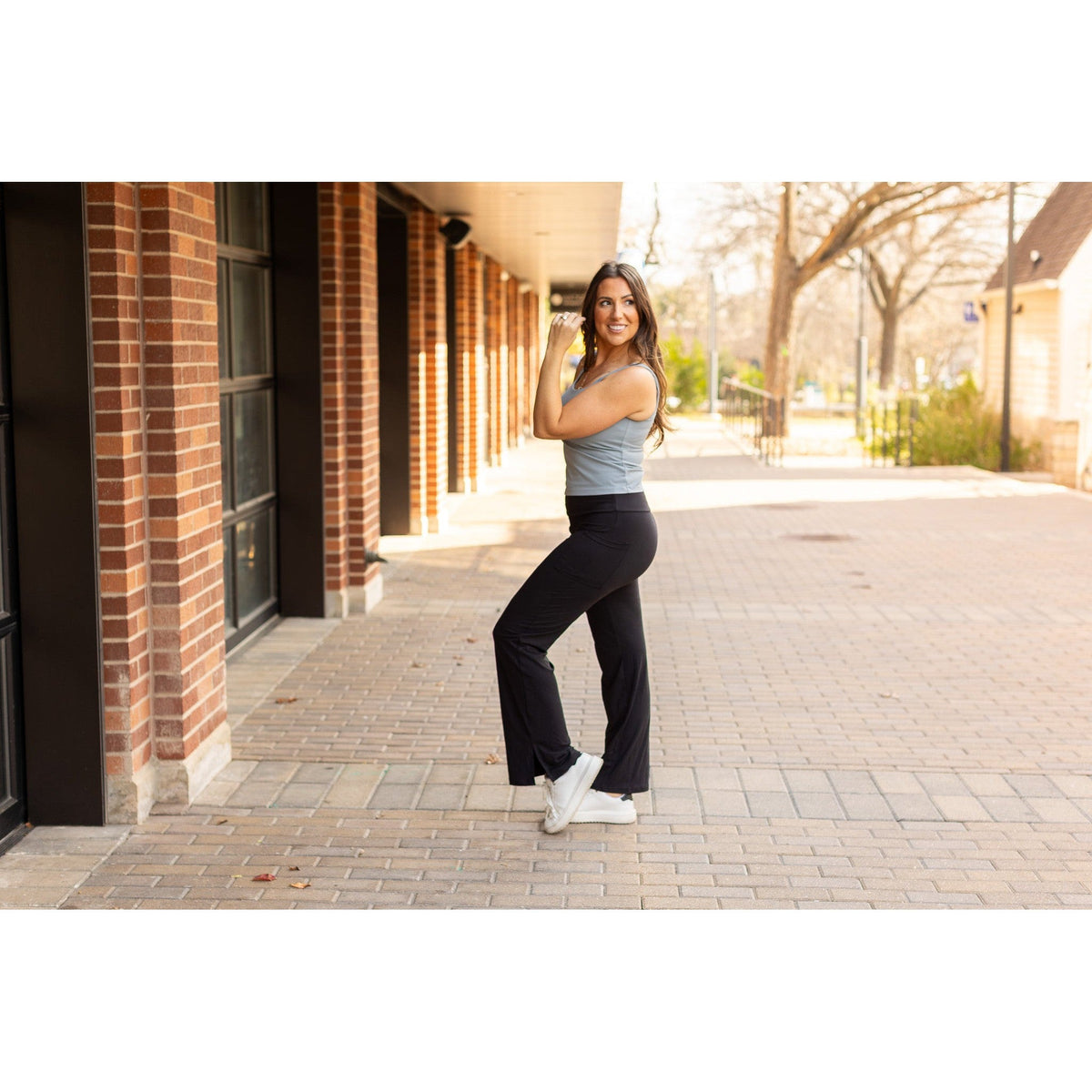 High-waisted relaxed fit leggings in buttery soft fabric. Close-up of waistband and pocket detail on Julia Rose Rachel leggings