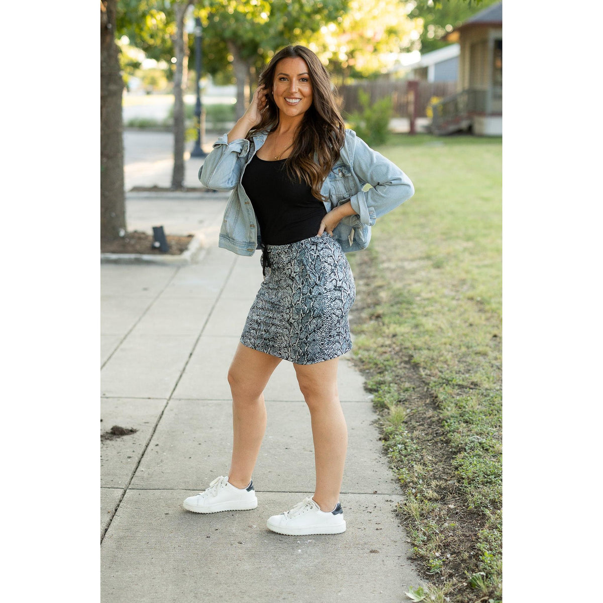 Julia Rose Sydney Snakeskin Jogger Skirt women’s boutique midi skirt front view, Woman wearing Julia Rose Sydney jogger style snakeskin skirt