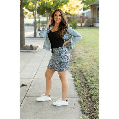 Julia Rose Sydney Snakeskin Jogger Skirt women’s boutique midi skirt front view, Woman wearing Julia Rose Sydney jogger style snakeskin skirt
