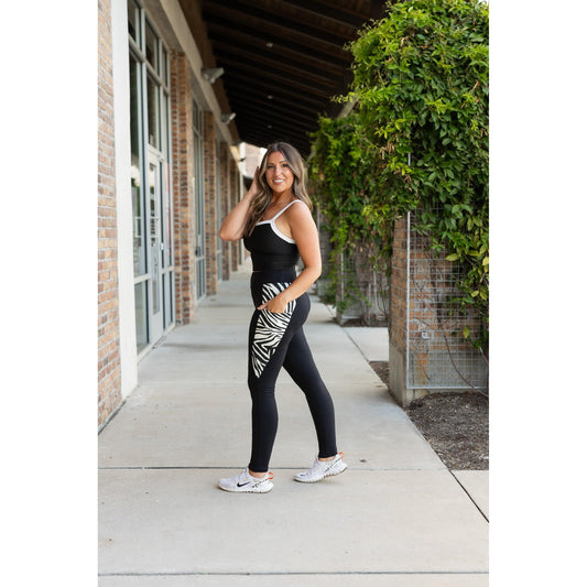 Women’s black leggings with zebra print panels  Stretchy leggings withflattering fit"