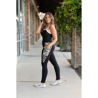 Women’s black leggings with zebra print panels  Stretchy leggings withflattering fit"