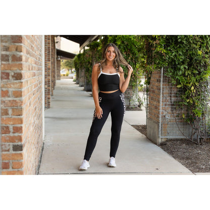 Julia Rose Carolina Cow Print Panel Leggings women’s boutique leggings front view, Woman wearing Julia Rose Carolina leggings with cow print panel detail