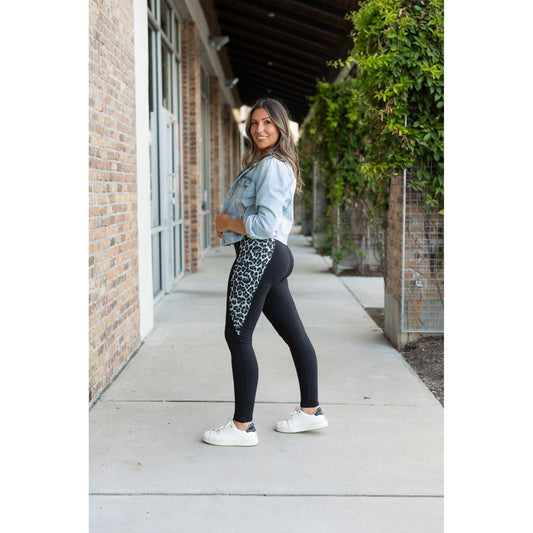 Snow leopard panel detail on  Buttery soft leopard panel leggings for women by Julia Rose