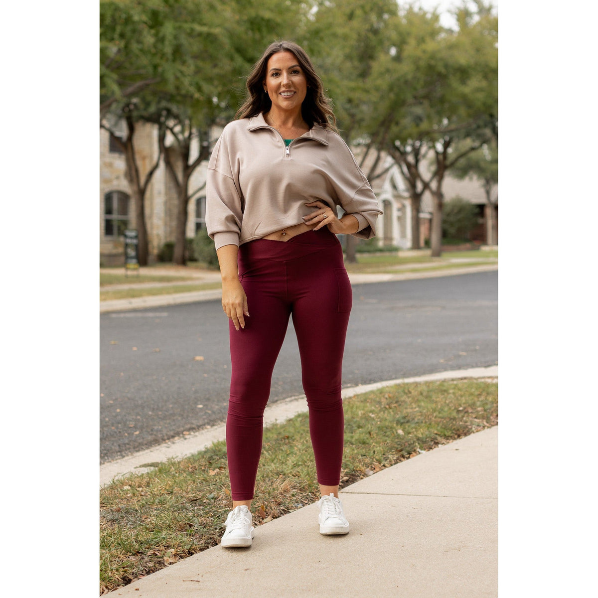 High-waisted maroon crossover leggings with pockets by Julia Rose, Julia Rose women’s maroon full length leggings lifestyle image