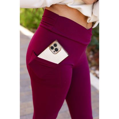High-waisted maroon crossover leggings with pockets by Julia Rose, Julia Rose women’s maroon full length leggings lifestyle image