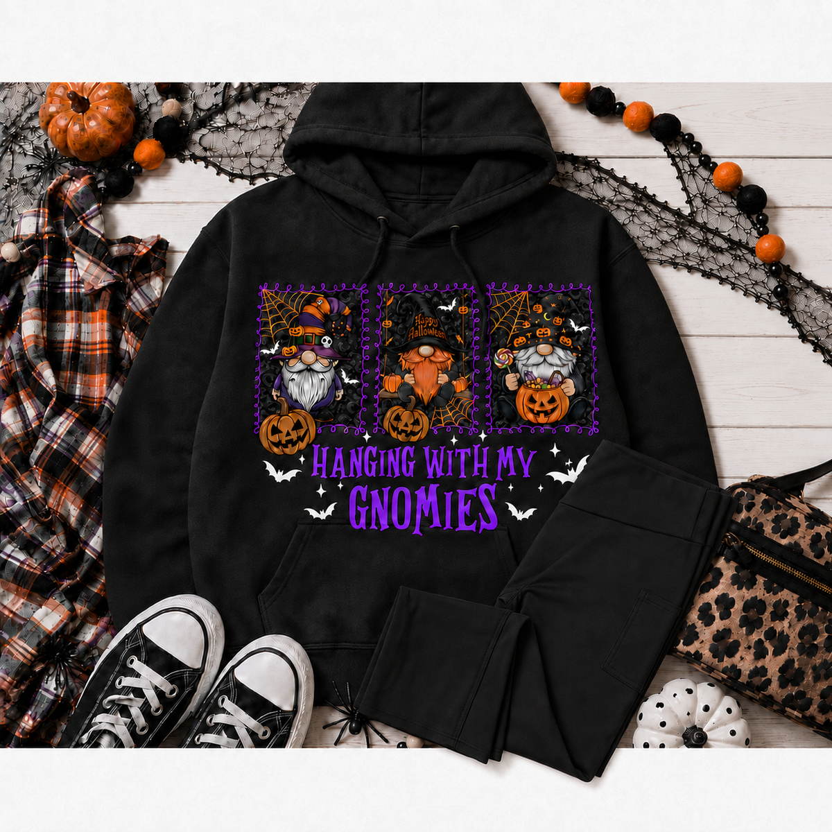 Julia Rose Hanging With My Gnomies apparel featuring three Halloween gnomes, pumpkins, bats and purple lettering.