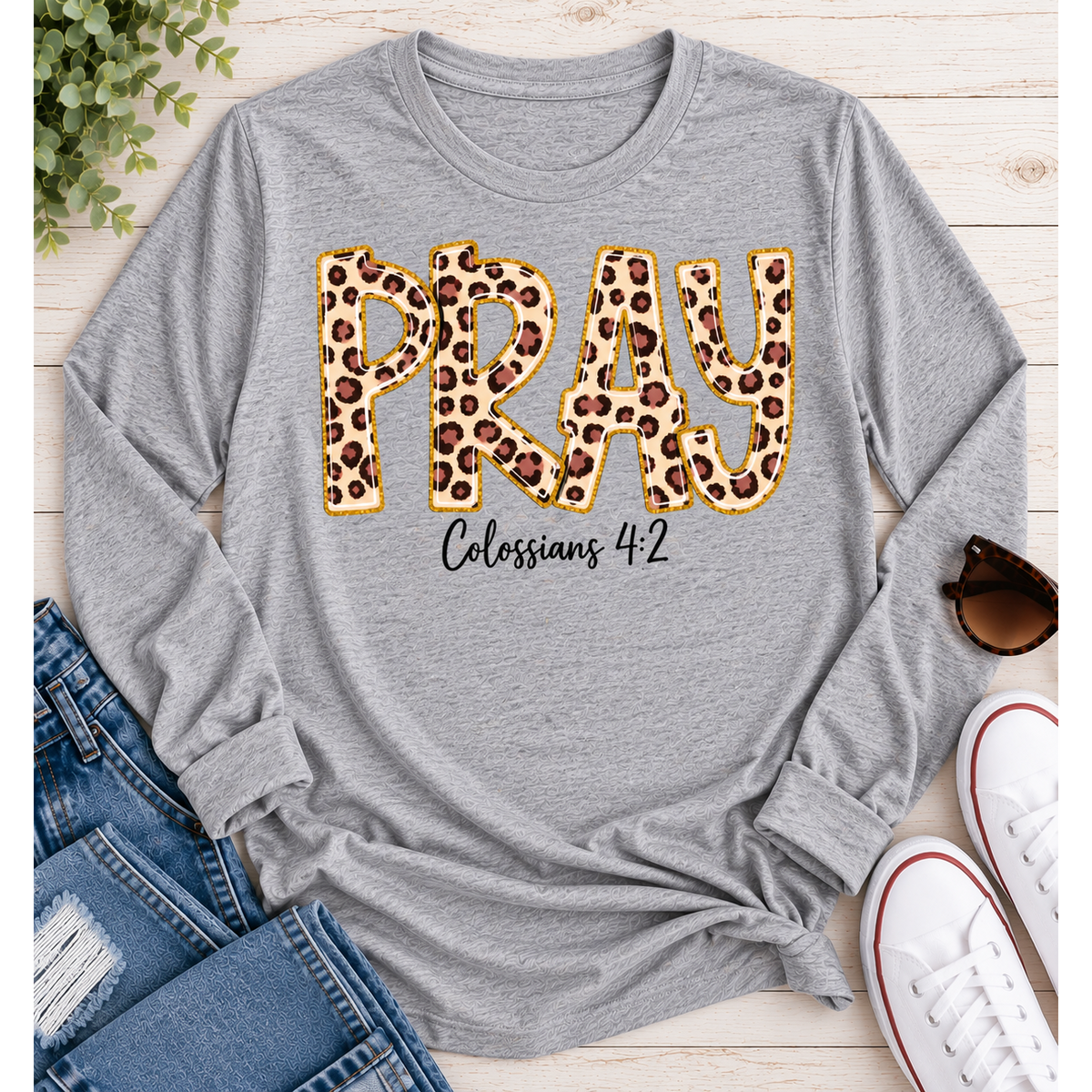 PRAY Colossians 4:2 leopard print Christian graphic shirt available in short sleeve crewneck, V-neck, long sleeve and hoodie styles.
