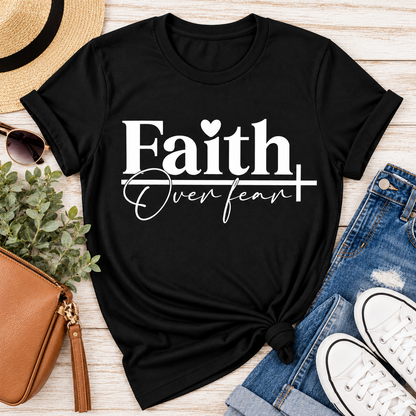 Faith Over Fear Christian inspirational graphic apparel featuring bold white Faith lettering, elegant Over Fear script, a small heart, and a cross design. Available in red and black in short sleeve crewneck, long sleeve crewneck, crewneck sweatshirt, and hoodie styles. Faith-based graphic clothing for women, everyday wear, church outfits, and inspirational gifts.