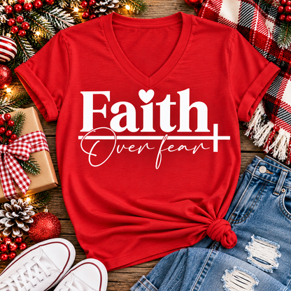 Faith Over Fear Christian inspirational graphic apparel featuring bold white Faith lettering, elegant Over Fear script, a small heart, and a cross design. Available in red and black in short sleeve crewneck, long sleeve crewneck, crewneck sweatshirt, and hoodie styles. Faith-based graphic clothing for women, everyday wear, church outfits, and inspirational gifts.