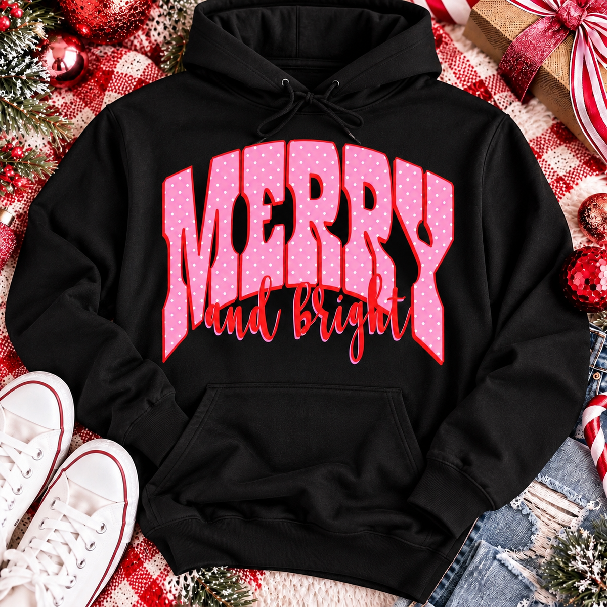 Merry and Bright Christmas graphic apparel with oversized pink polka dot lettering and festive holiday design