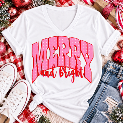 Merry and Bright Christmas graphic apparel with oversized pink polka dot lettering and festive holiday design