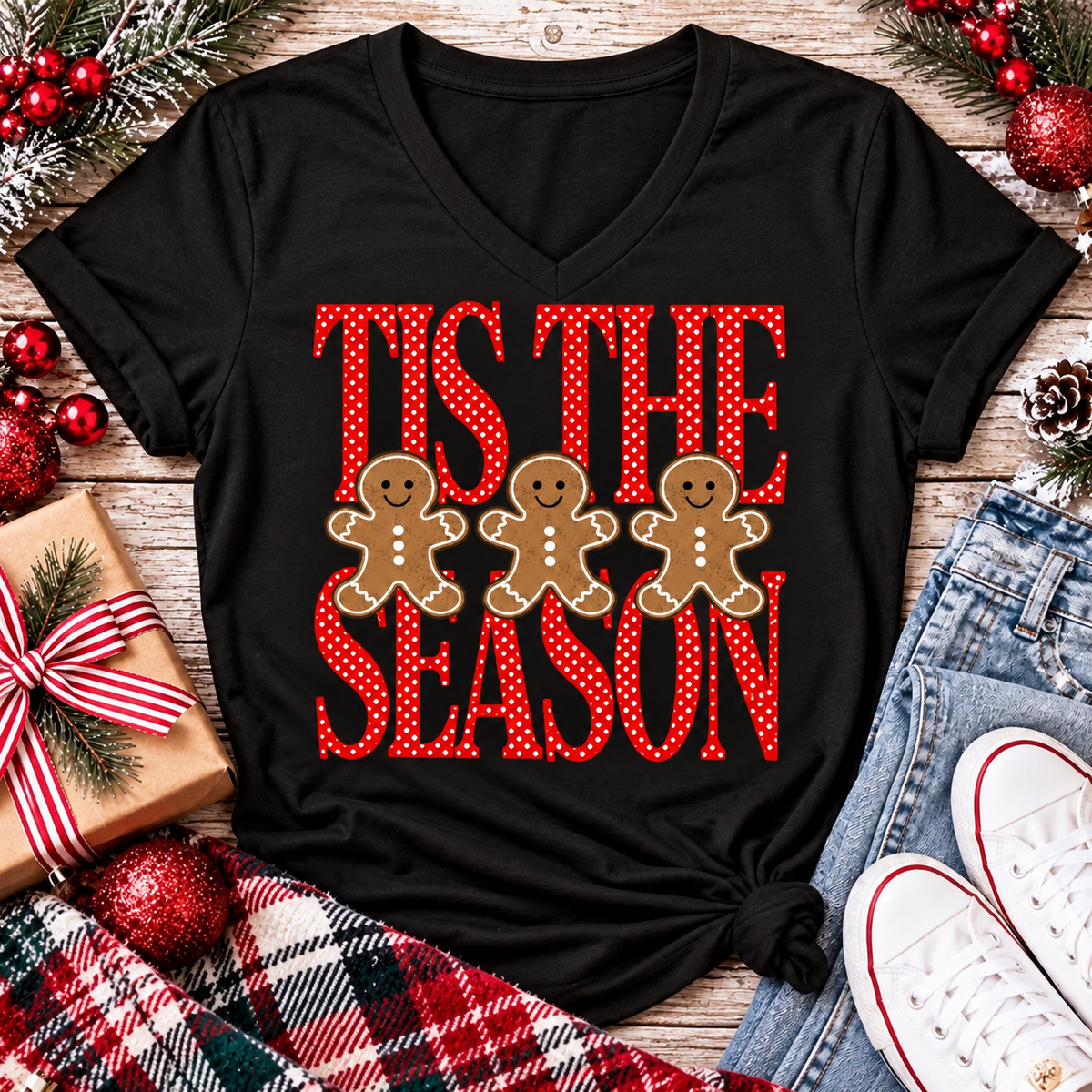 Tis the Season Christmas graphic apparel featuring red polka dot lettering and three gingerbread cookies