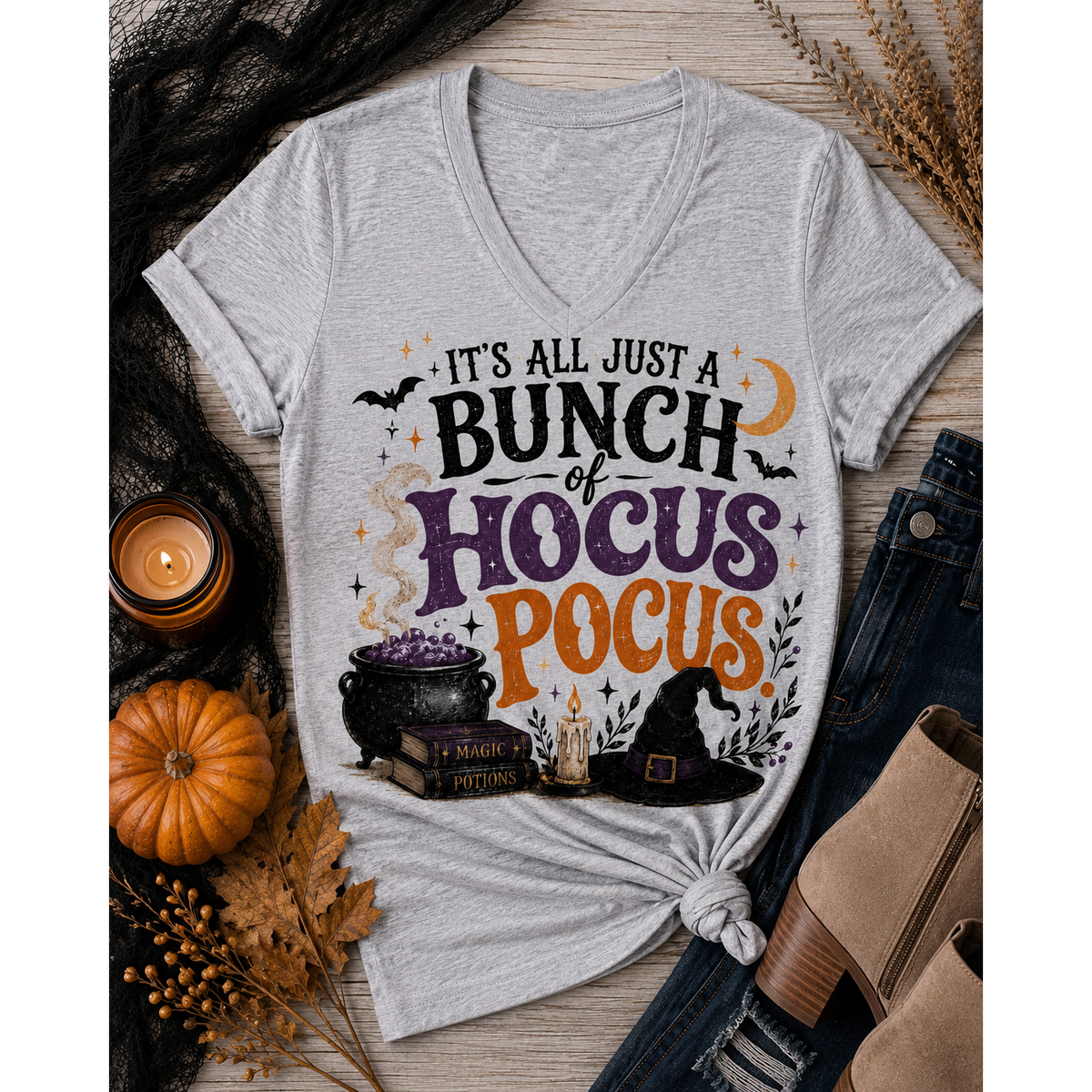 Hocus Pocus Halloween graphic V-neck tee with witch hat, cauldron and spell books