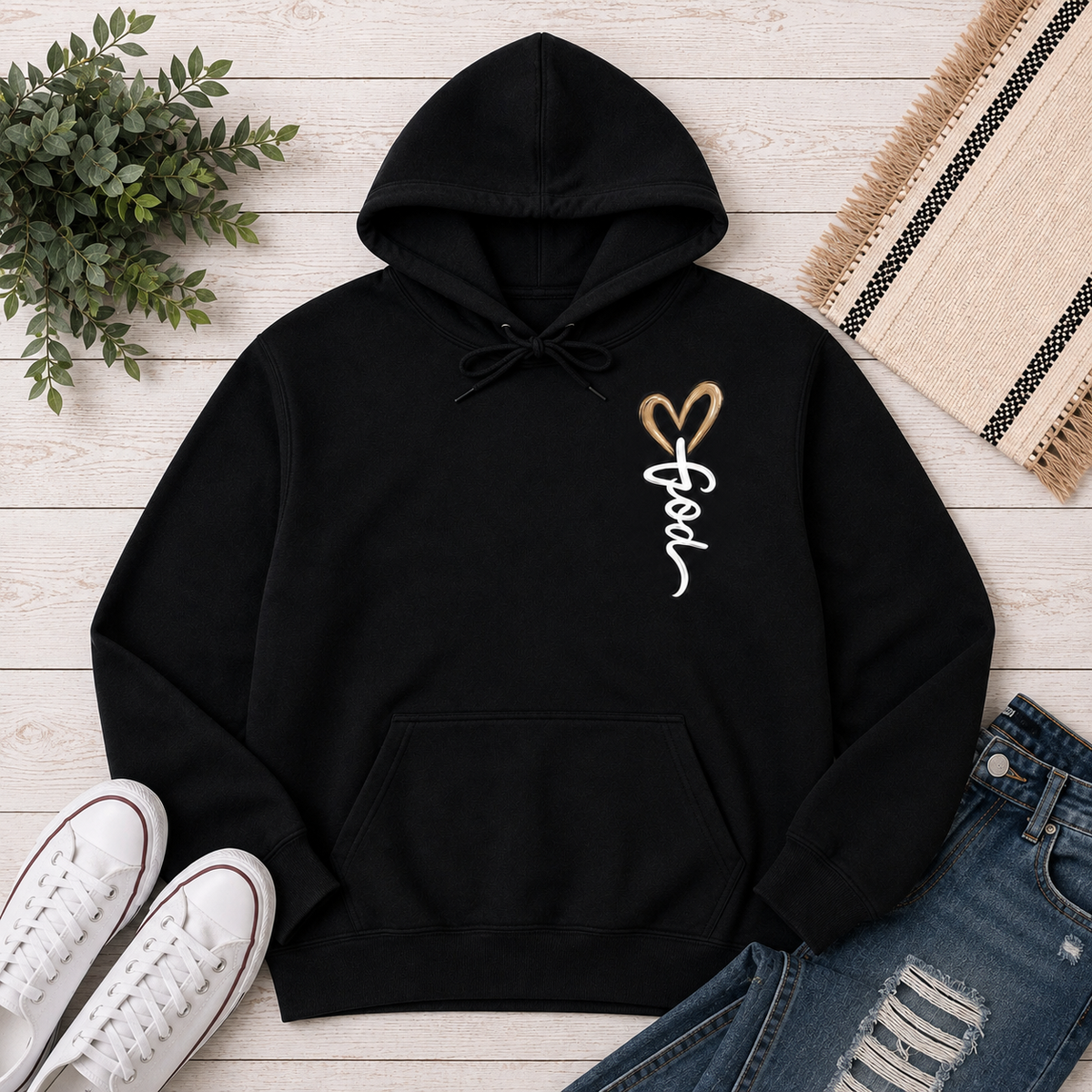 Black hoodie with God heart front graphic and Way Maker leopard cross faith graphic on back