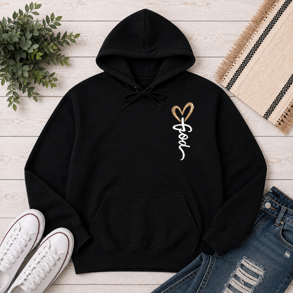 Black hoodie with God heart front graphic and Way Maker leopard cross faith graphic on back