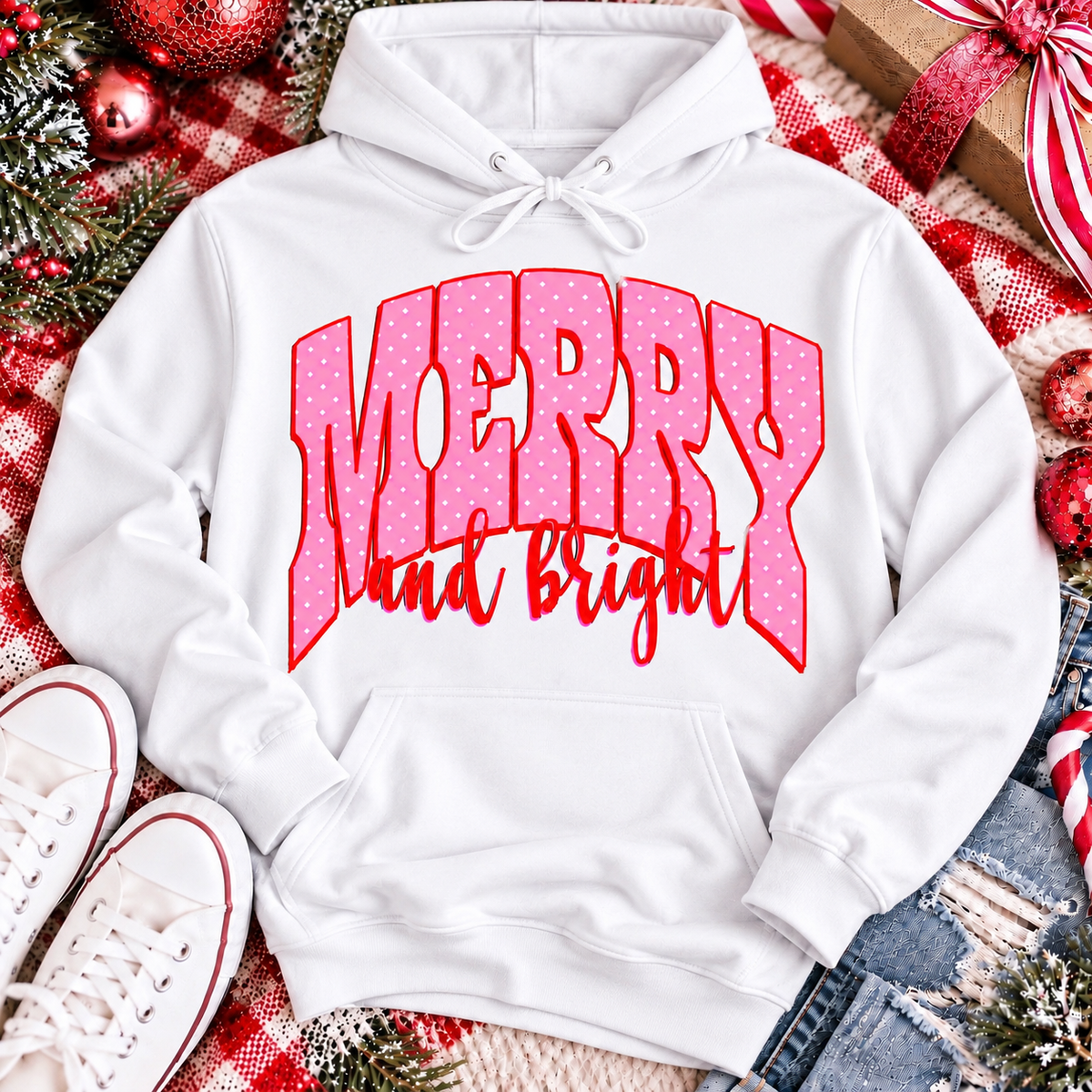 Merry and Bright Christmas graphic apparel with oversized pink polka dot lettering and festive holiday design